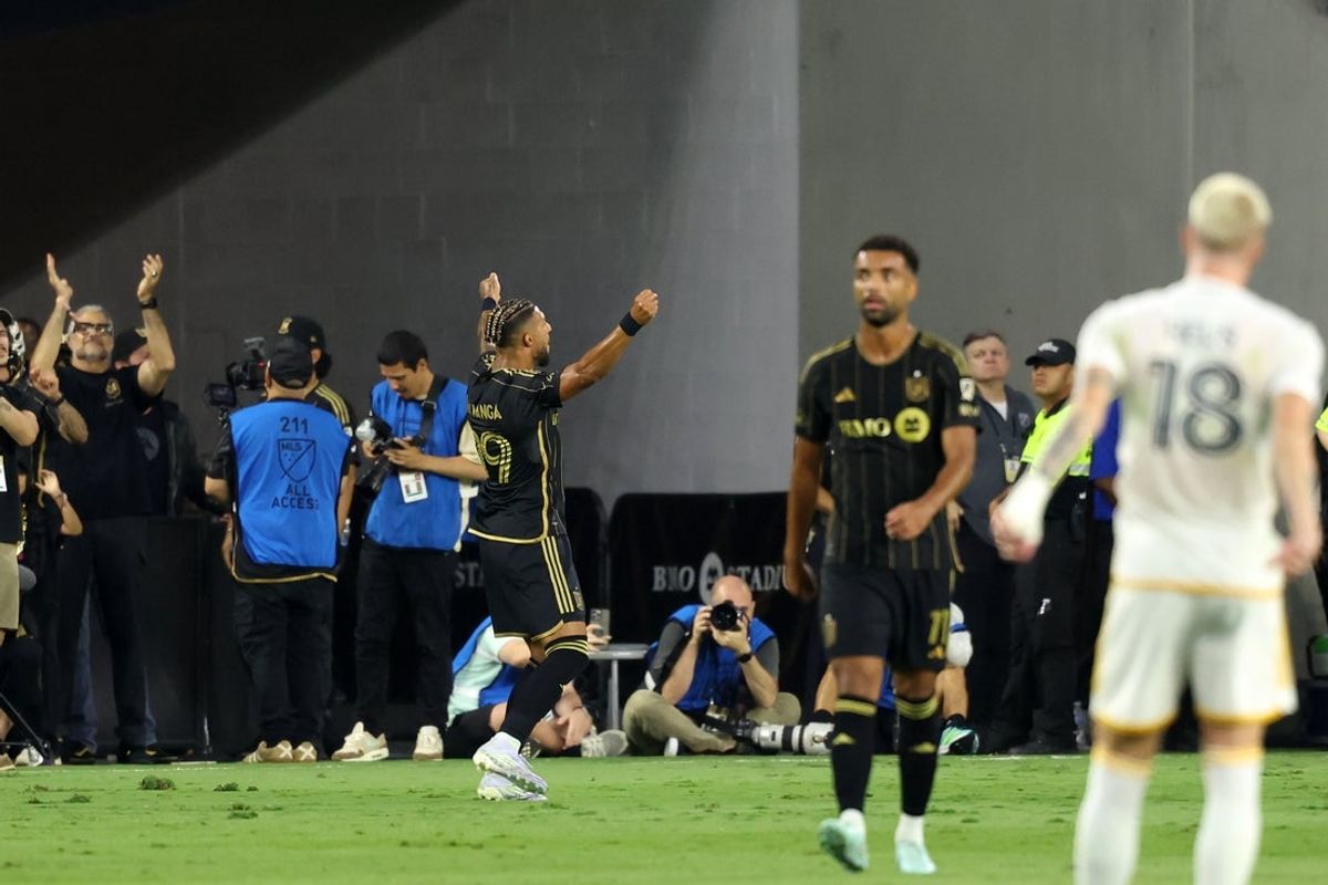 Jul 19, 2025; Los Angeles, California, USA;  LAFC forward Denis Bouanga (99) celebrates after scoring a goal during the first half against the LA Galaxy at BMO Stadium. Mandatory Credit: Kiyoshi Mio-Imagn Images