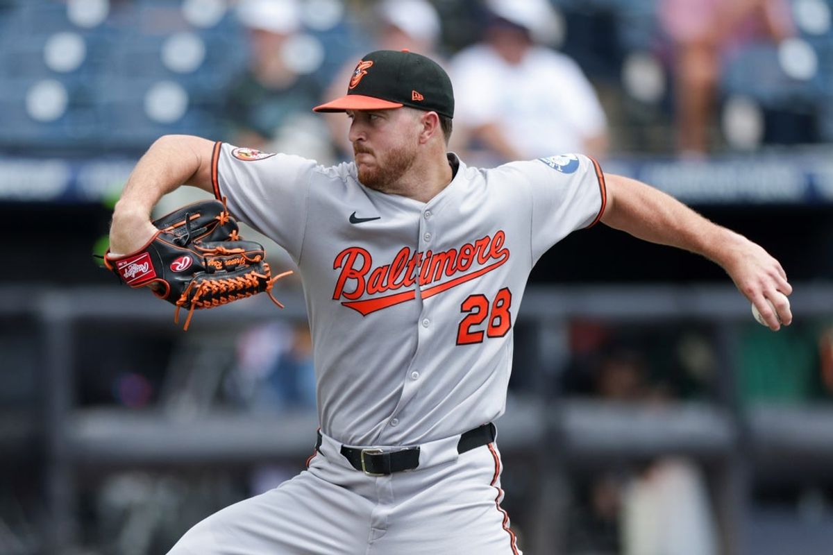 Jul 20, 2025; Tampa, Florida, USA; Baltimore Orioles starting pitcher Trevor Rogers (28) throws a pitch against the Tampa Bay Rays in the first inning at George M. Steinbrenner Field. Mandatory Credit: Nathan Ray Seebeck-Imagn Images