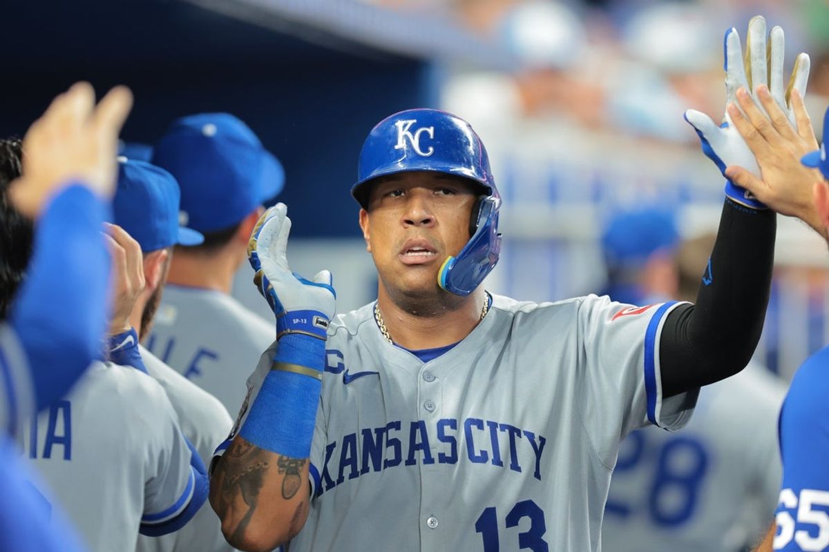 Jul 20, 2025; Miami, Florida, USA; Kansas City Royals first baseman Salvador Perez (13) celebrates after scoring against the Miami Marlins during the fourth inning at loanDepot Park. Mandatory Credit: Sam Navarro-Imagn Images