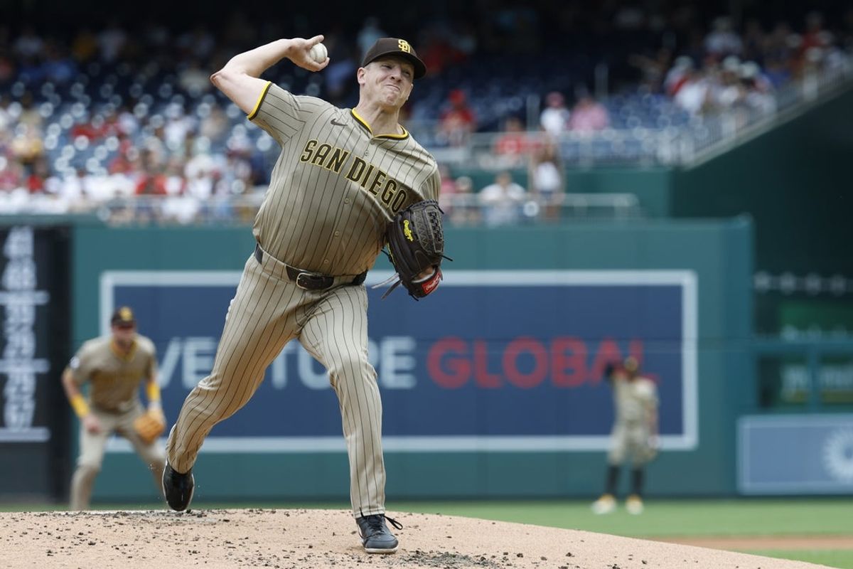 Jul 20, 2025; Washington, District of Columbia, USA; San Diego Padres starting pitcher Nick Pivetta (27) pitches against the Washington Nationals during the first inning at Nationals Park. Mandatory Credit: Geoff Burke-Imagn Images