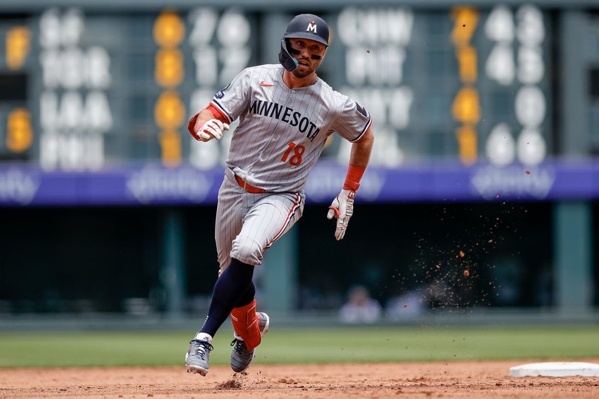 Jul 20, 2025; Denver, Colorado, USA; Minnesota Twins second baseman Kody Clemens (18) rounds second on a triple in the third inning against the Colorado Rockies at Coors Field. Mandatory Credit: Isaiah J. Downing-Imagn Images
