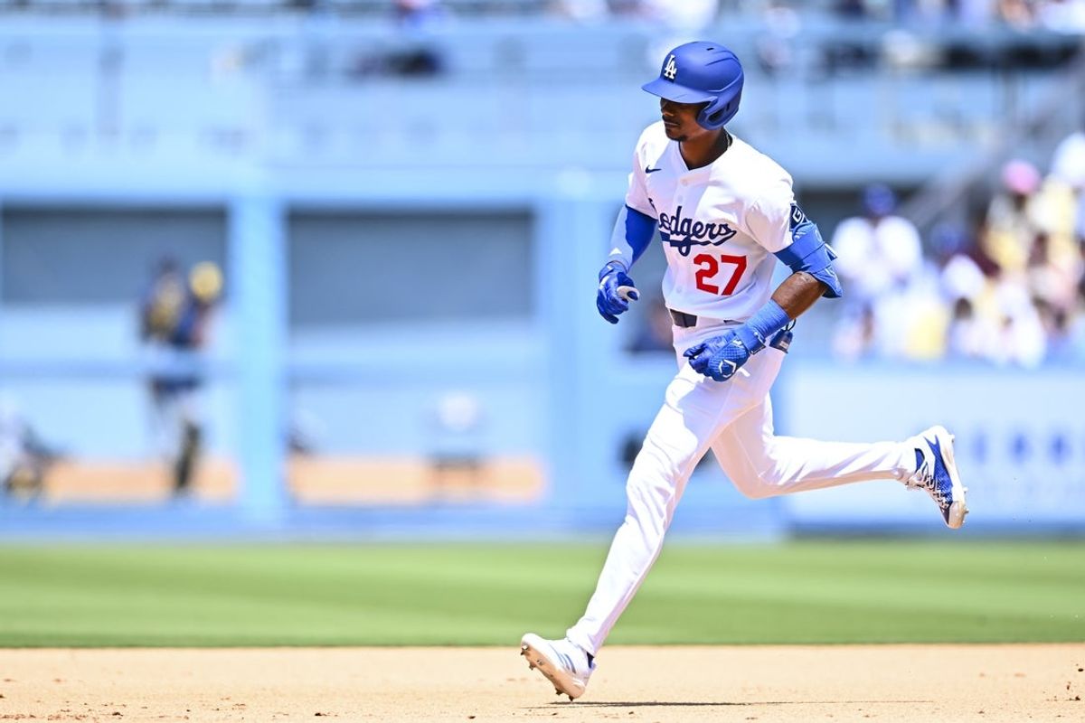 Jul 20, 2025; Los Angeles, California, USA; Los Angeles Dodgers outfielder Esteury Ruiz (27) rounds the bases after he hit a solo home run against the Milwaukee Brewers during the fifth inning at Dodger Stadium. Mandatory Credit: Jonathan Hui-Imagn Images
