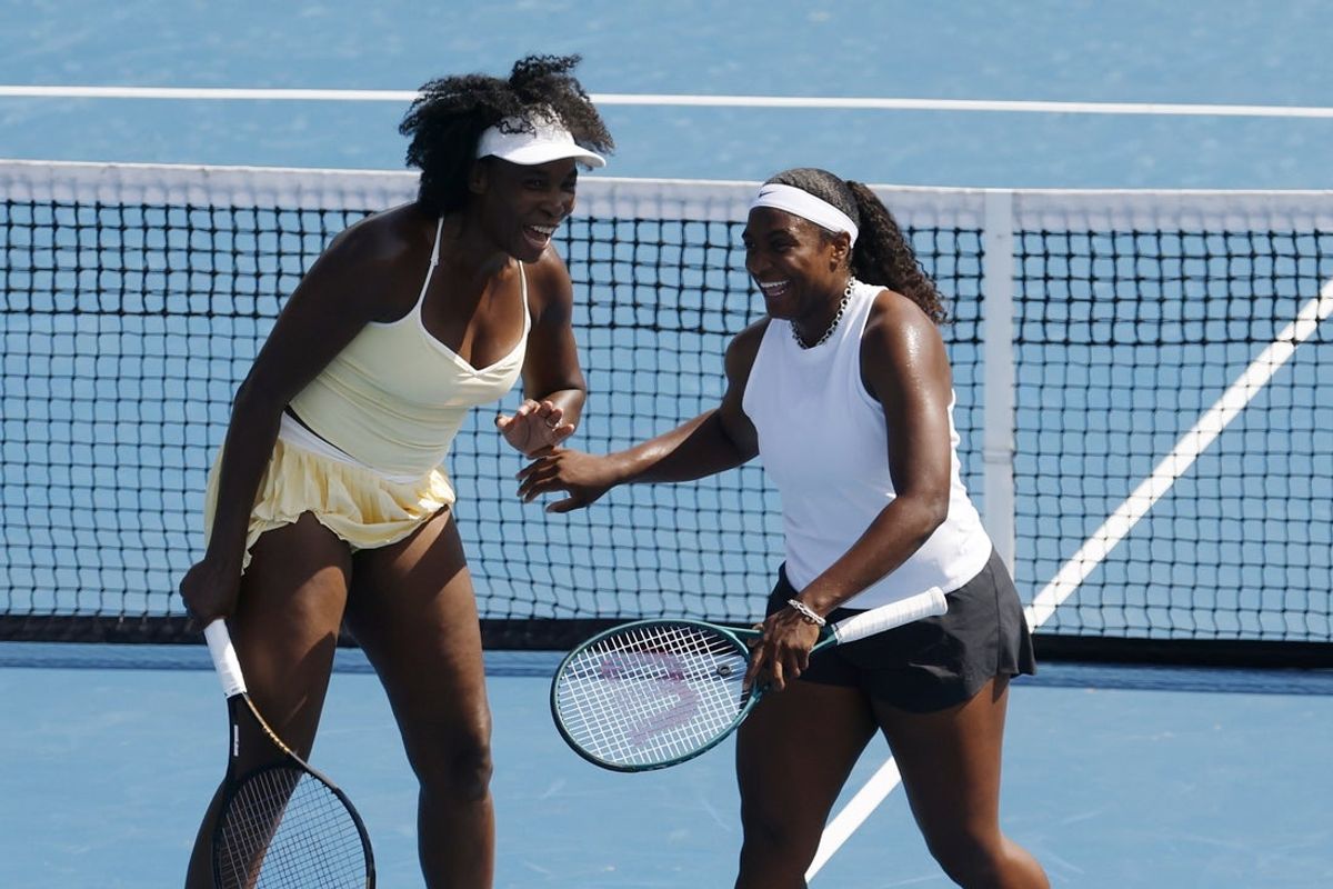 Jul 21, 2025; Washington, D.C., USA; Venus Williams (USA)(L) and partner Hailey Baptiste (USA)(R) celebrate after winning a point against Eugenie Bouchard (CAN) and Clervie Ngounoue (USA) (both not pictured) in a women's doubles match on day one of the Mubadala Citi DC Open at Rock Creek Park Tennis Center. Mandatory Credit: Geoff Burke-Imagn Images