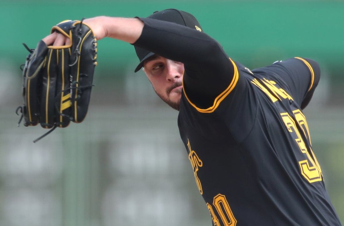 Jul 21, 2025; Pittsburgh, Pennsylvania, USA;  Pittsburgh Pirates starting pitcher Paul Skenes (30) delivers a pitch against the Detroit Tigers during the first inning at PNC Park. Mandatory Credit: Charles LeClaire-Imagn Images
