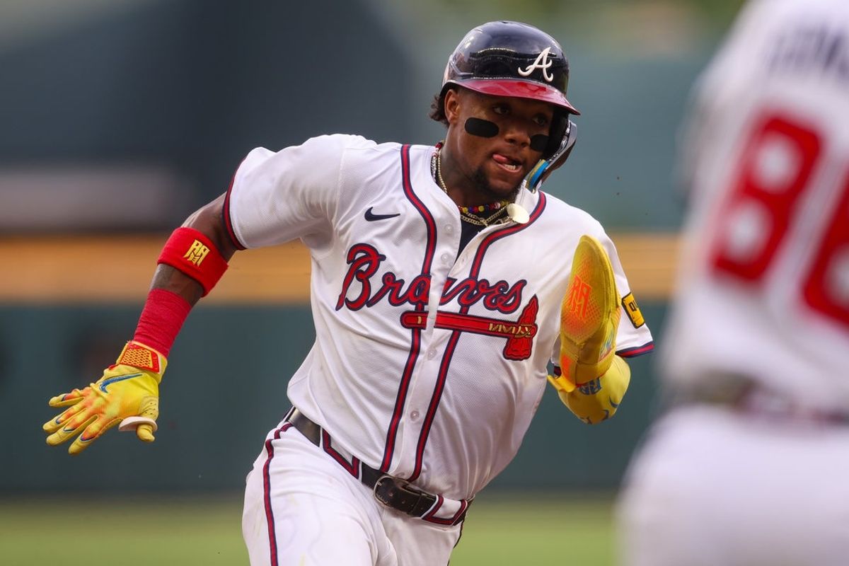 Jul 21, 2025; Atlanta, Georgia, USA; Atlanta Braves right fielder Ronald Acuna Jr. (13) scores a run against the San Francisco Giants in the first inning at Truist Park. Mandatory Credit: Brett Davis-Imagn Images