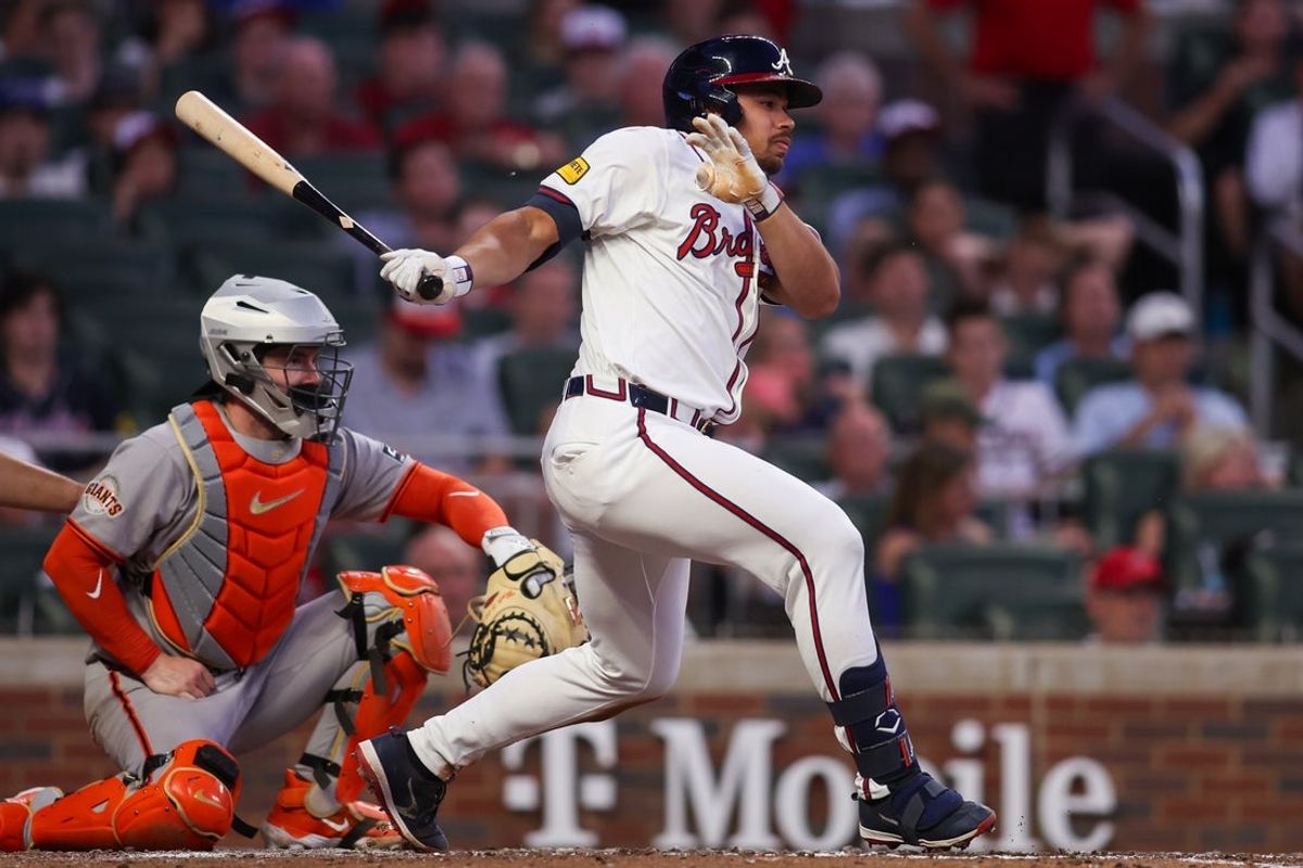 Jul 21, 2025; Atlanta, Georgia, USA; Atlanta Braves catcher Drake Baldwin (30) hits a two-run single against the San Francisco Giants in the fourth inning at Truist Park. Mandatory Credit: Brett Davis-Imagn Images