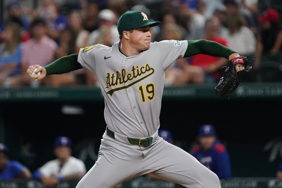 July 21, 2025; Arlington, Texas, USA; Athletics pitcher Mason Miller (19) throws to the plate during the eighth inning against the Texas Rangers at Globe Life Field. Mandatory Credit: Raymond Carlin III-Imagn Images