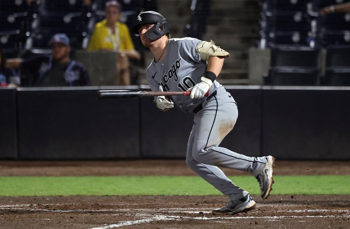 Jul 21, 2025; St. Petersburg, Florida, USA;  Chicago White Sox shortstop Chase Meidroth (10) doubles during the ninth inning against the Tampa Bay Rays at George M. Steinbrenner Field. Mandatory Credit: Kim Klement Neitzel-Imagn Images