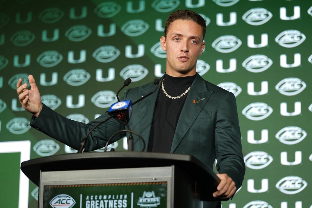 Jul 22, 2025; Charlotte, NC, USA; Miami quarterback Carson Beck answers questions from the media during ACC Media Days at Hilton Charlotte Uptown. Mandatory Credit: Jim Dedmon-Imagn Images
