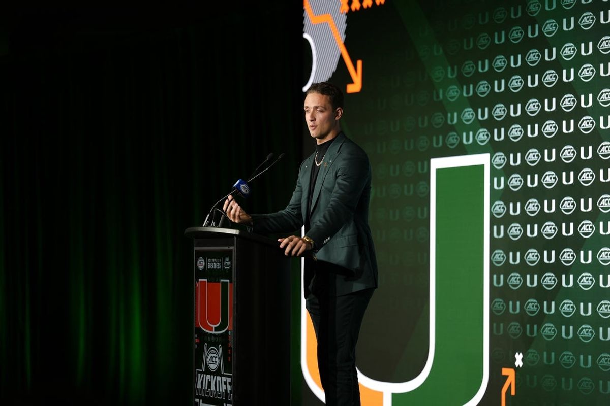 Miami quarterback Carson Beck answers questions from the media during ACC Media Days at Hilton Charlotte Uptown. Mandatory Credit: Jim Dedmon-Imagn Images