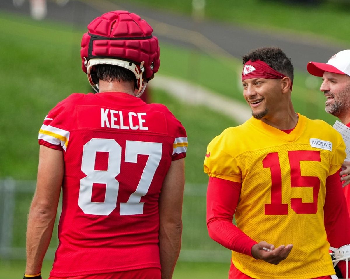 Jul 22, 2025; St. Joseph, MO, USA; Kansas City Chiefs quarterback Patrick Mahomes (15) laughs with tight end Travis Kelce (87) during training camp at Missouri Western State University. Mandatory Credit: Denny Medley-Imagn Images