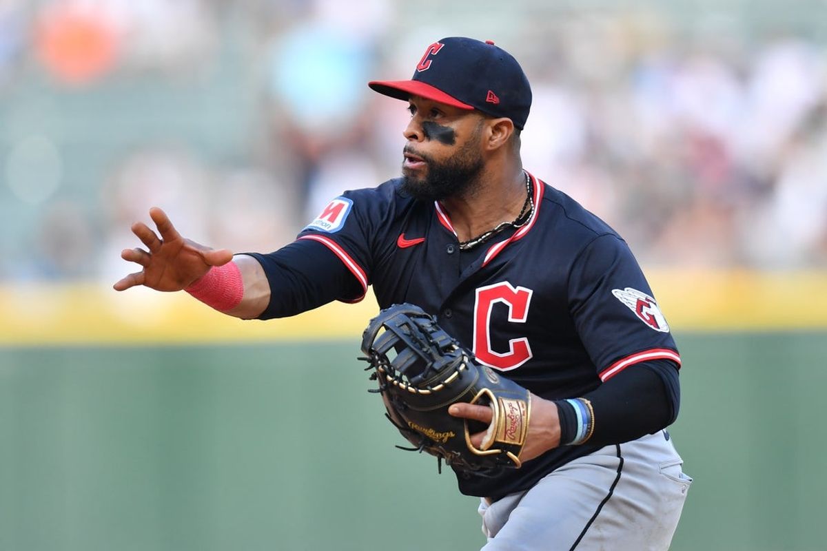 Jul 12, 2025; Chicago, Illinois, USA; Cleveland Guardians first baseman Carlos Santana (41) throws to first base during the eighth inning against the Chicago White Sox at Rate Field. Mandatory Credit: Patrick Gorski-Imagn Images