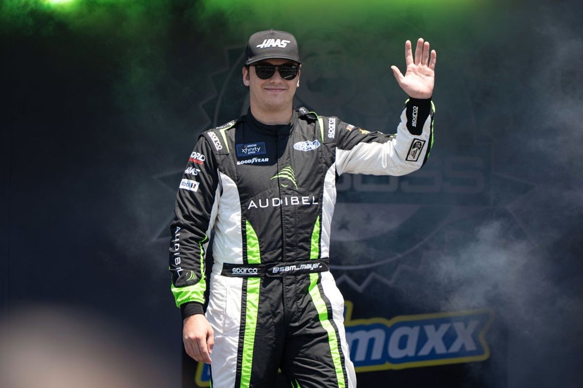 Jul 12, 2025; Sonoma, California, USA;  NASCAR Xfinity Series driver Sam Mayer (41) waves after being introduced to fans before the start of the NASCAR Xfinity Series Race at Sonoma Raceway. Mandatory Credit: Stan Szeto-Imagn Images