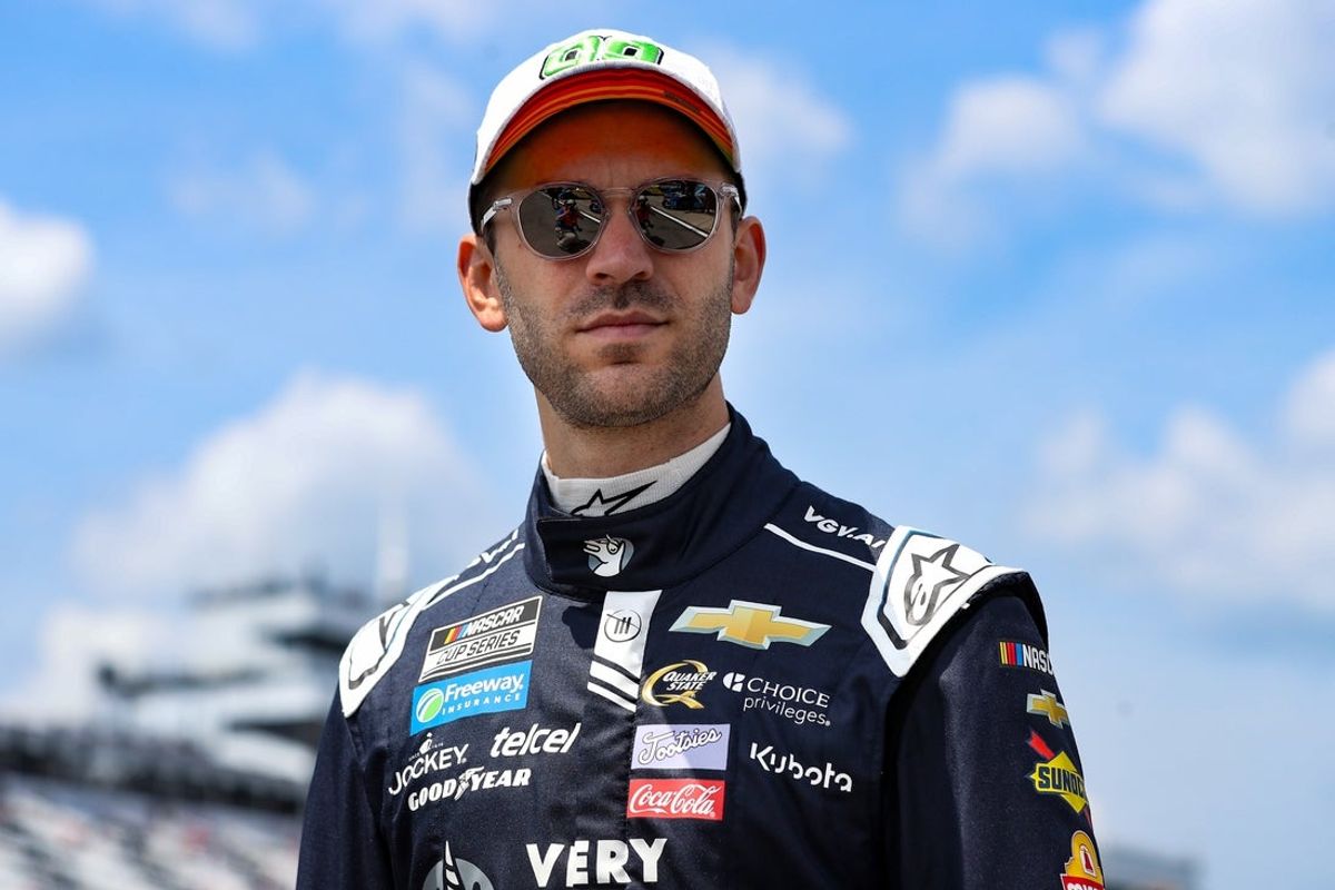 Jun 21, 2025; Long Pond, Pennsylvania, USA; NASCAR Cup Series driver Daniel Suarez walks on pit road during practice and qualifying for The Great American Getaway 400 at Pocono Raceway. Mandatory Credit: Matthew O'Haren-Imagn Images