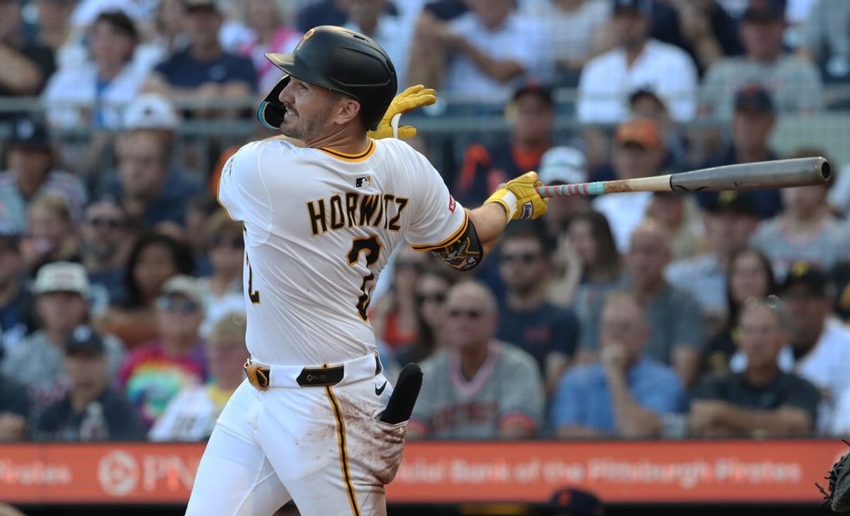 Jul 22, 2025; Pittsburgh, Pennsylvania, USA;  Pittsburgh Pirates first baseman Spencer Horwitz (2) hits a two run double against the Detroit Tigers during the second inning at PNC Park. Mandatory Credit: Charles LeClaire-Imagn Images