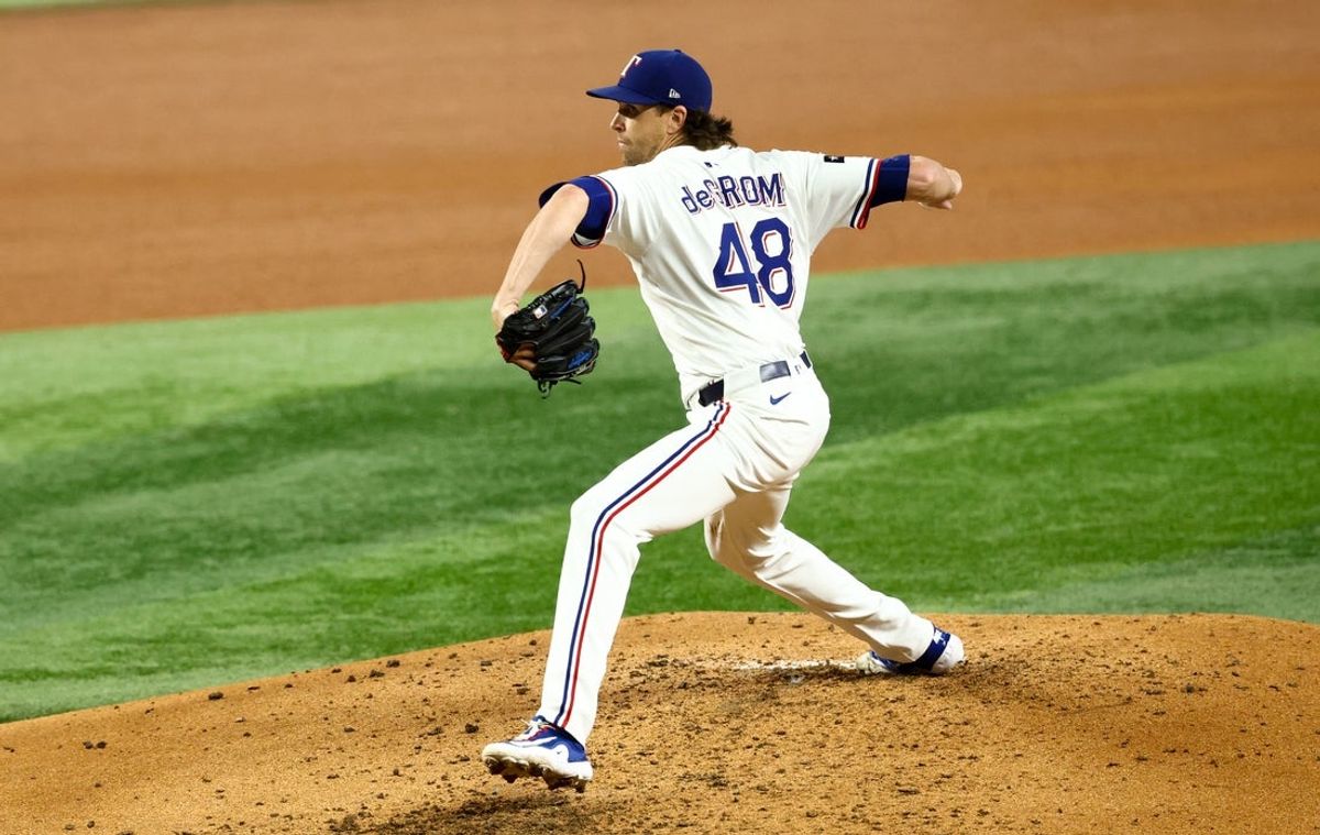Jul 22, 2025; Arlington, Texas, USA;  Texas Rangers starting pitcher Jacob deGrom (48) throws during the fourth inning against the Athletics at Globe Life Field. Mandatory Credit: Kevin Jairaj-Imagn Images