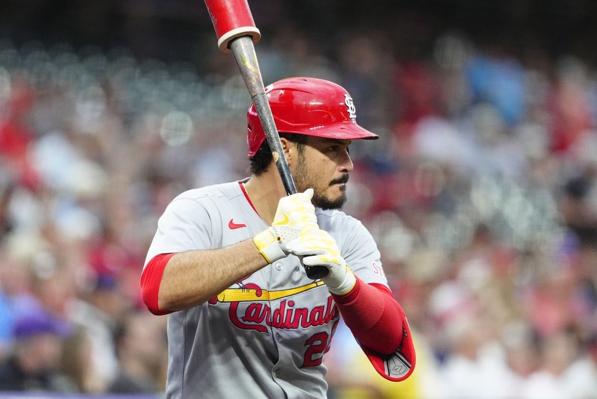 Jul 22, 2025; Denver, Colorado, USA; St. Louis Cardinals third baseman Nolan Arenado (28) on deck in the first inning against the Colorado Rockies at Coors Field. Mandatory Credit: Ron Chenoy-Imagn Images