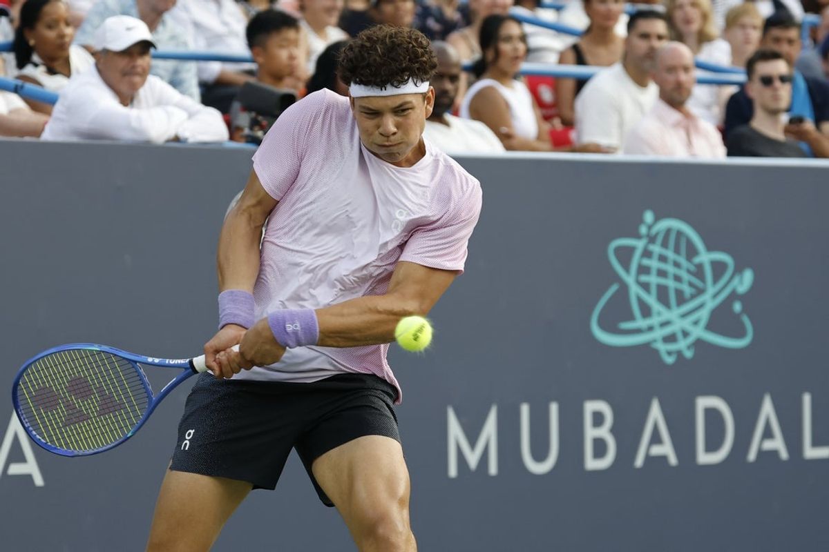 Jul 22, 2025; Washington, D.C., USA; Ben Shelton (USA) hits a backhand against Mackenzie McDonald (USA)(not pictured) in a men's singles match on day two of the Mubadala Citi DC Open at Rock Creek Park Tennis Center. Mandatory Credit: Geoff Burke-Imagn Images