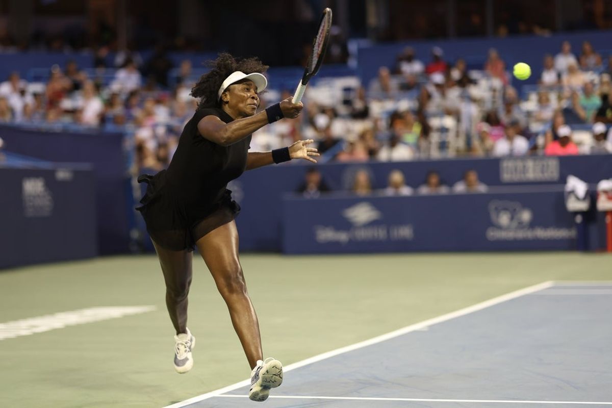 Jul 22, 2025; Washington, D.C., USA; Venus Williams (USA) hits a forehand against Peyton Stearns (USA)(not pictured) in a women's singles match on day two of the Mubadala Citi DC Open at Rock Creek Park Tennis Center. Mandatory Credit: Geoff Burke-Imagn Images