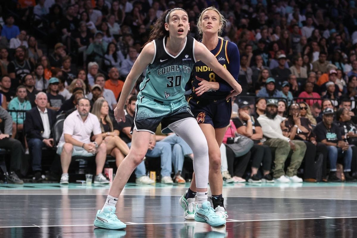 Jul 22, 2025; Brooklyn, New York, USA;  New York Liberty forward Breanna Stewart (30) and Indiana Fever guard Sophie Cunningham (8) box out for a rebound in the third quarter at Barclays Center. Mandatory Credit: Wendell Cruz-Imagn Images