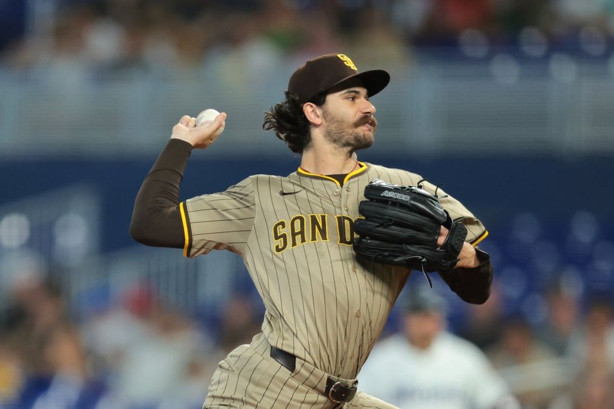 Jul 23, 2025; Miami, Florida, USA; San Diego Padres starting pitcher Dylan Cease (84) delivers a pitch against the Miami Marlins during the first inning at loanDepot Park. Mandatory Credit: Sam Navarro-Imagn Images