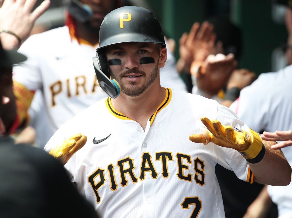 Jul 23, 2025; Pittsburgh, Pennsylvania, USA;  Pittsburgh Pirates first baseman Spencer Horwitz (2) celebrates his grand slam home run in the dugout against the Detroit Tigers during the second inning at PNC Park. Mandatory Credit: Charles LeClaire-Imagn Images