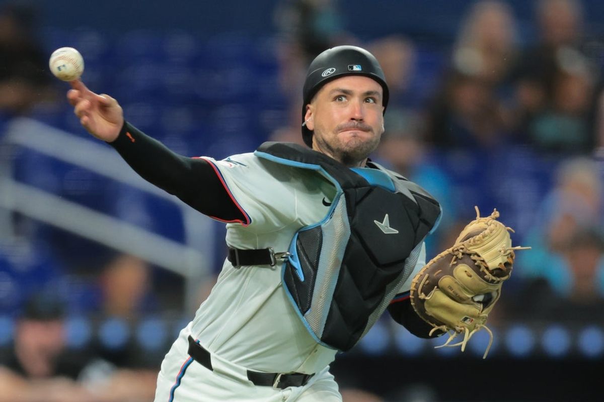 Jul 23, 2025; Miami, Florida, USA; Miami Marlins catcher Nick Fortes (4) throws to first base to retire San Diego Padres third baseman Manny Machado (not pictured) during the ninth inning at loanDepot Park. Mandatory Credit: Sam Navarro-Imagn Images