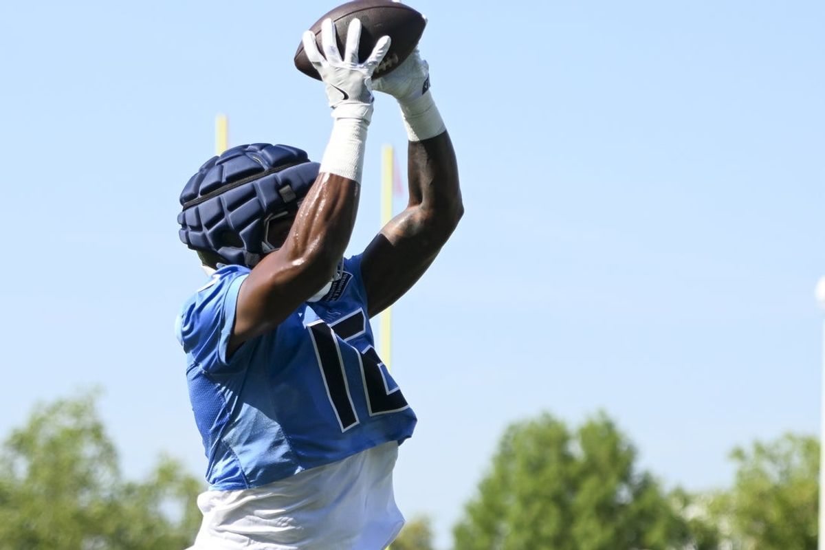 Jul 23, 2025; Nashville, TN, USA;  Tennessee Titans wide receiver Treylon Burks (16) makes a catch during training camp at Ascension Saint Thomas Sports Park. Mandatory Credit: Steve Roberts-Imagn Images