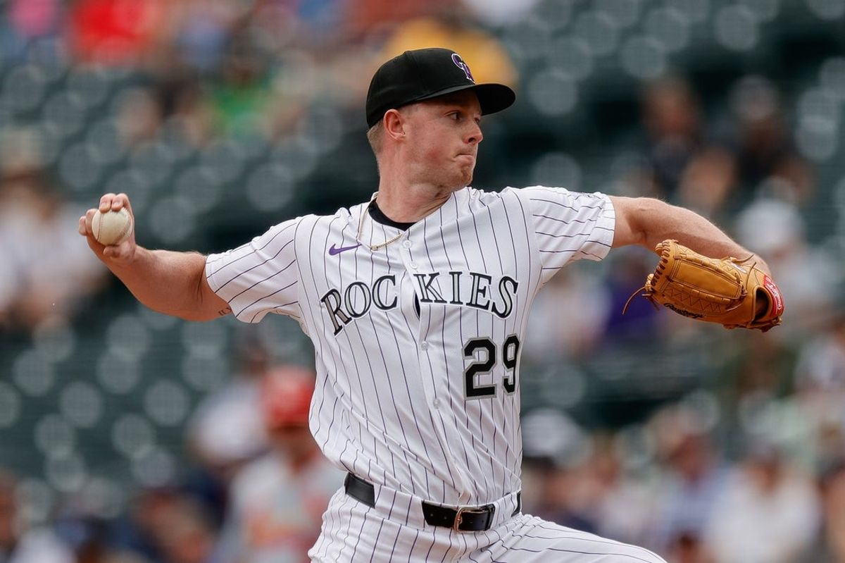 Jul 23, 2025; Denver, Colorado, USA; Colorado Rockies starting pitcher Tanner Gordon (29) pitches in the first inning against the St. Louis Cardinals at Coors Field. Mandatory Credit: Isaiah J. Downing-Imagn Images