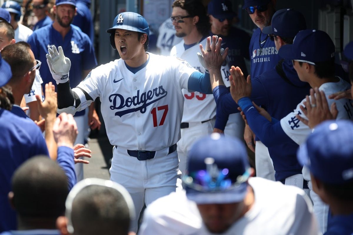 Jul 23, 2025; Los Angeles, California, USA; Los Angeles Dodgers designated hitter Shohei Ohtani (17) celebrates a solo home run during the first inning against the Minnesota Twins at Dodger Stadium. Mandatory Credit: Kiyoshi Mio-Imagn Images