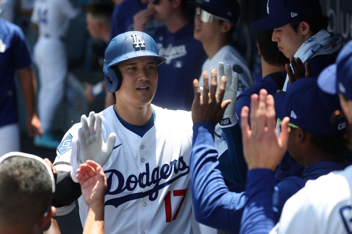 Jul 23, 2025; Los Angeles, California, USA; Los Angeles Dodgers designated hitter Shohei Ohtani (17) celebrates a solo home run during the first inning against the Minnesota Twins at Dodger Stadium. Mandatory Credit: Kiyoshi Mio-Imagn Images