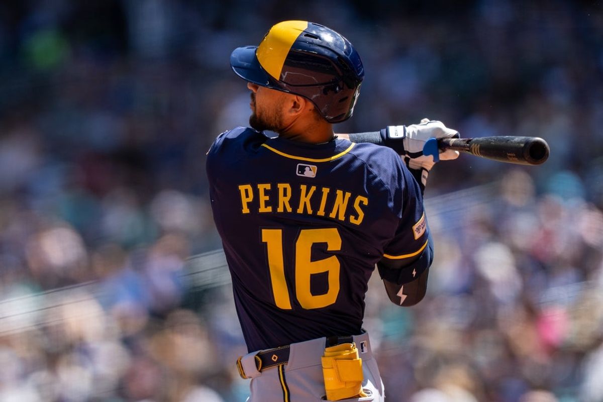 Jul 23, 2025; Seattle, Washington, USA;  Milwaukee Brewers centerfielder Blake Perkins (16) hits a two-run double during the second inning against the Seattle Mariners at T-Mobile Park. Mandatory Credit: Stephen Brashear-Imagn Images