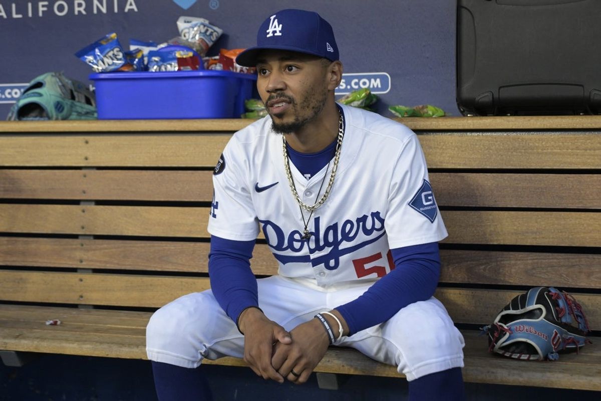 Jul 22, 2025; Los Angeles, California, USA;  Los Angeles Dodgers shortstop Mookie Betts (50) in the dugout prior to the first inning of the game against the Minnesota Twins at Dodger Stadium. Mandatory Credit: Jayne Kamin-Oncea-Imagn Images