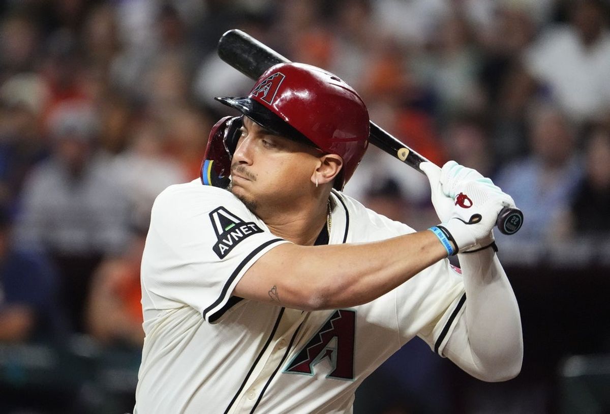 Arizona Diamondbacks' Josh Naylor bats against the Houston Astros in the first inning at Chase Field in Phoenix on July 23, 2025.