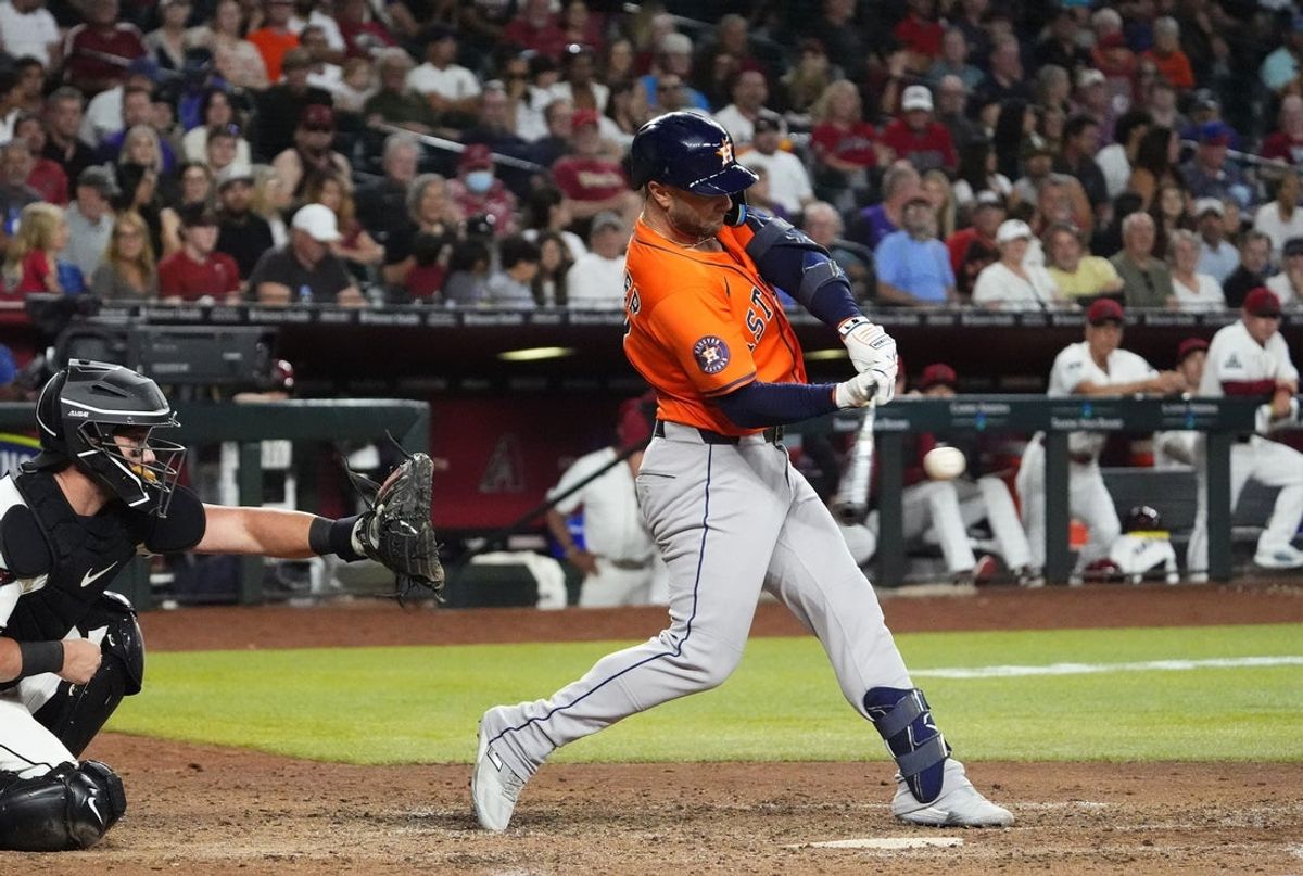 Houston Astros' Christian Walker hits a game-winning RBI-single against the Arizona Diamondbacks in the ninth inning at Chase Field in Phoenix on July 23, 2025.