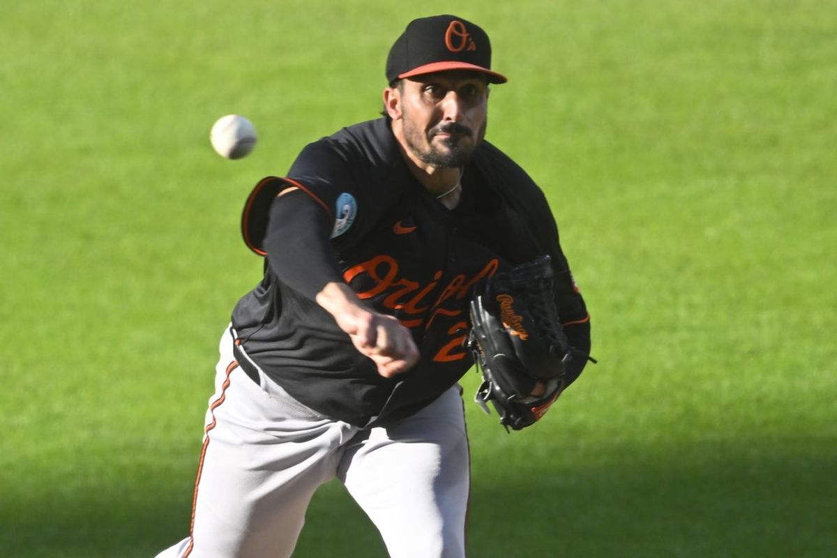 Jul 23, 2025; Cleveland, Ohio, USA; Baltimore Orioles starting pitcher Zach Eflin (24) delivers a pitch in the second inning against the Cleveland Guardians at Progressive Field. Mandatory Credit: David Richard-Imagn Images