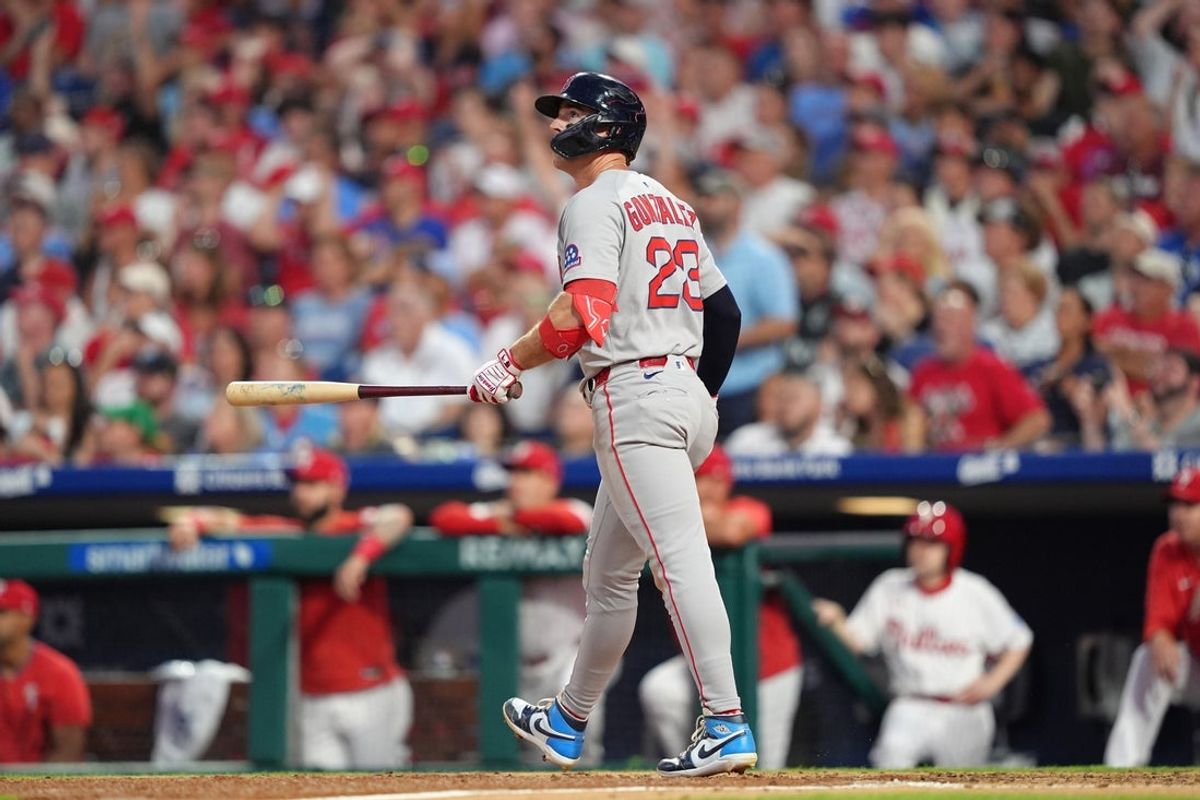 Jul 23, 2025; Philadelphia, Pennsylvania, USA; Boston Red Sox infielder Romy Gonzalez (23) watches the ball after hitting a grand slam against the Philadelphia Phillies in the fifth inning at Citizens Bank Park. Mandatory Credit: Kyle Ross-Imagn Images