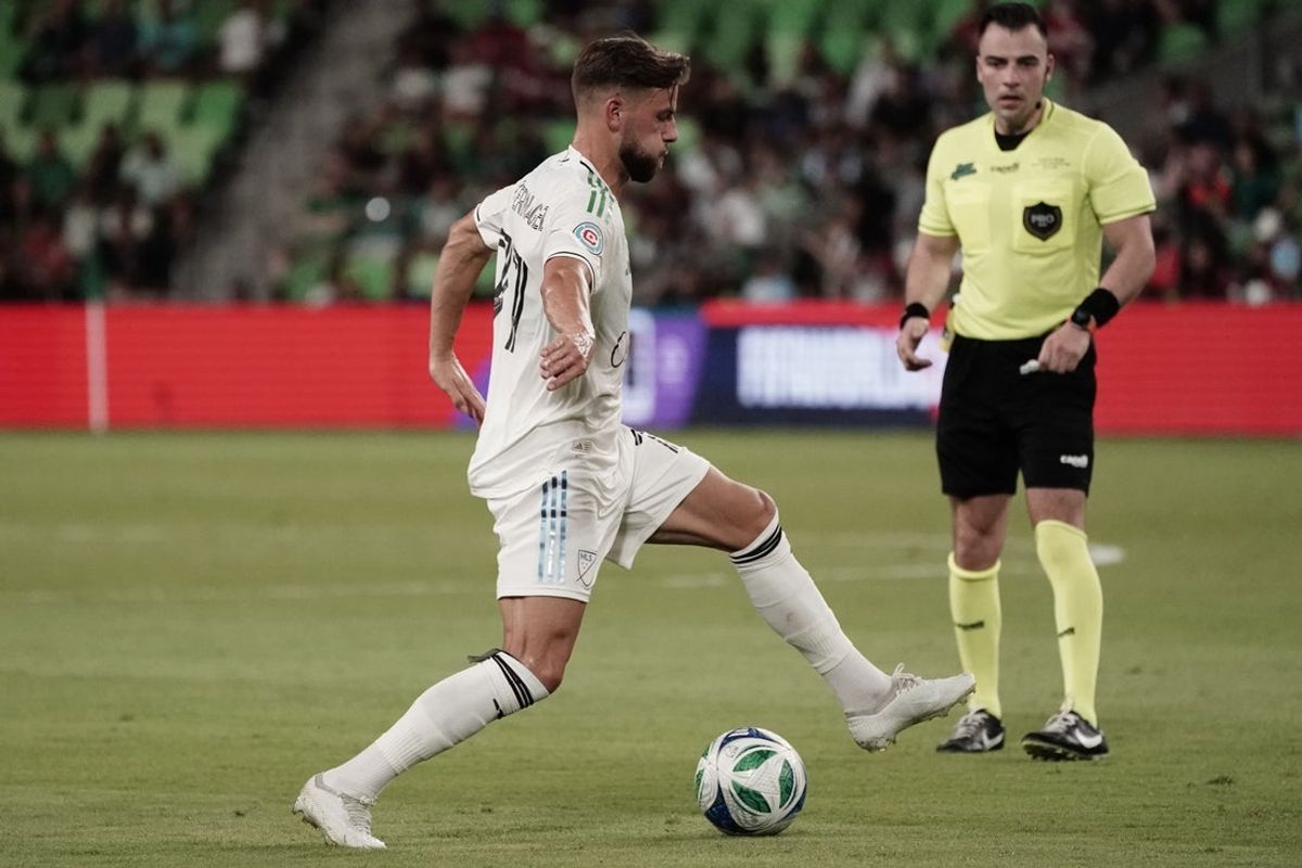 Jul 23, 2025; Austin, Texas, USA; MLS All Stars midfielder Philip Zinckernagel (77) of Chicago Fire FC  kicks the ball in the second half during the 2025 MLS All-Star Game at Q2 Stadium. Mandatory Credit: Dustin Safranek-Imagn Images