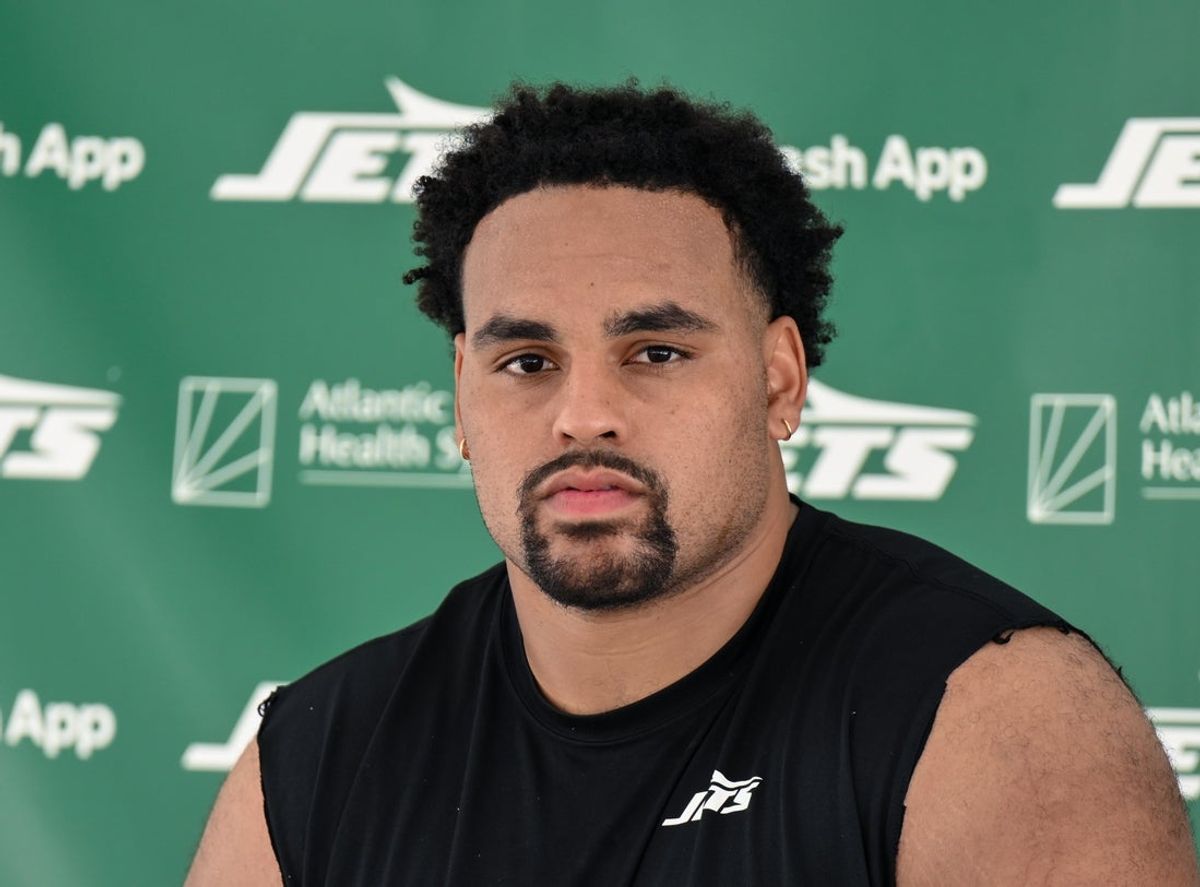 Jul 24, 2025; Florham Park, NY, USA; New York Jets guard Alijah Vera-Tucker (75) speaks to the media during training camp at Atlantic Health Jets Training Center. Mandatory Credit: John Jones-Imagn Images
