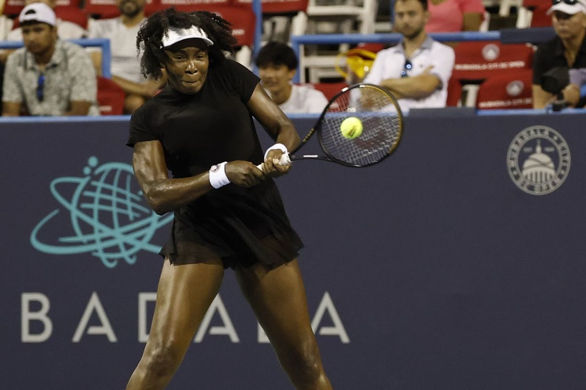 Jul 24, 2025; Washington, D.C., USA; Venus Williams (USA) hits a backhand against Magdalena Frech (POL)(not pictured) in a women's singles match on day four of the Mubadala Citi DC Open at Rock Creek Park Tennis Center. Mandatory Credit: Geoff Burke-Imagn Images