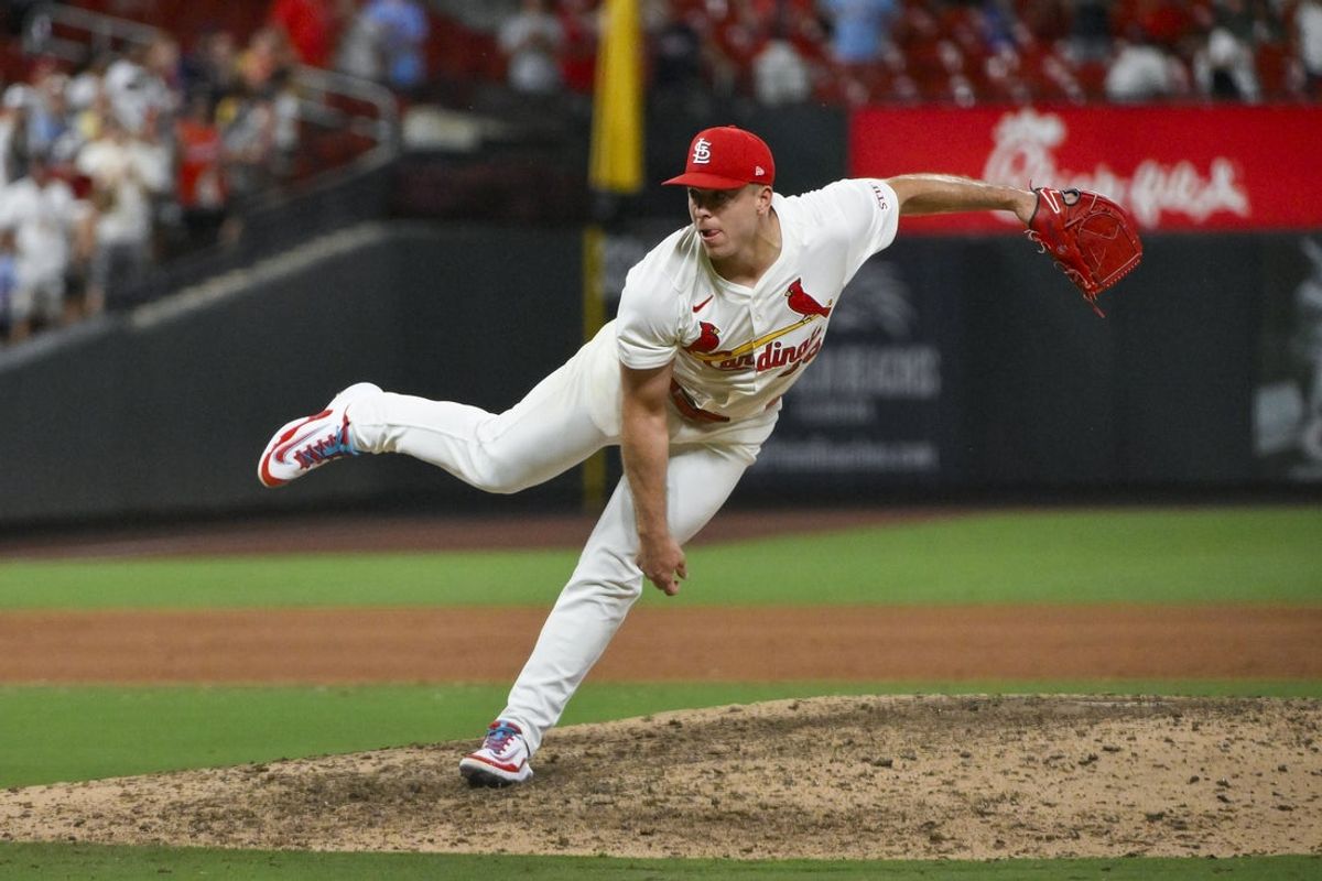 Jul 24, 2025; St. Louis, Missouri, USA;  St. Louis Cardinals relief pitcher Ryan Helsley (56) pitches against the San Diego Padres during the ninth inning at Busch Stadium. Mandatory Credit: Jeff Curry-Imagn Images
