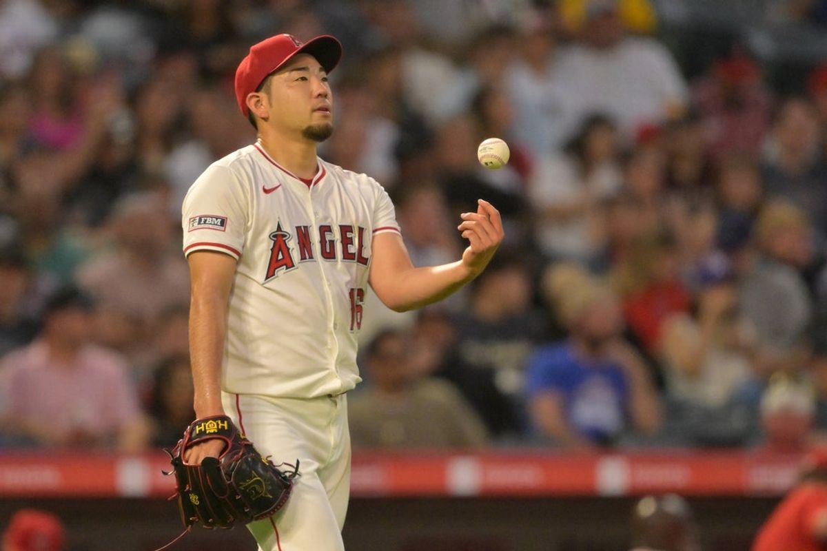 Jul 24, 2025; Anaheim, California, USA;  Los Angeles Angels starting pitcher Yusei Kikuchi (16) reacts after giving up three runs in the fifth inning against the Seattle Mariners at Angel Stadium. Mandatory Credit: Jayne Kamin-Oncea-Imagn Images