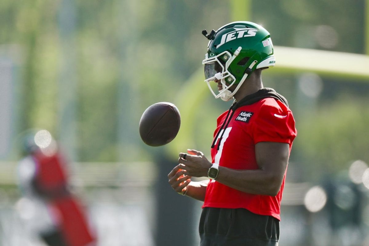 Jul 25, 2025; Florham Park, NJ, USA; New York Jets quarterback Justin Fields (7) looks on during a drill at training camp at Atlantic Health Jets Training Center. Mandatory Credit: John Jones-Imagn Images