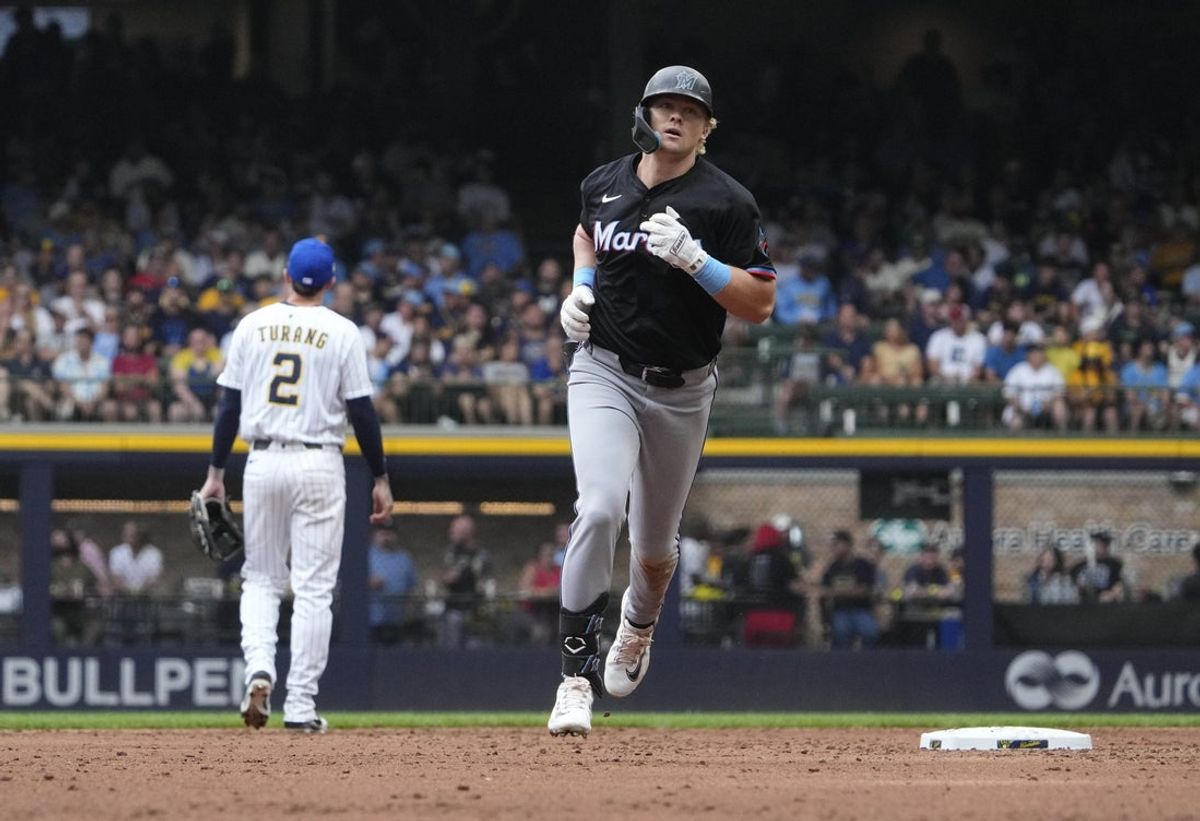 Jul 25, 2025; Milwaukee, Wisconsin, USA; Miami Marlins outfielder Kyle Stowers (28) rounds the bases after hitting a home run against the Milwaukee Brewers in the third inning at American Family Field. Mandatory Credit: Michael McLoone-Imagn Images
