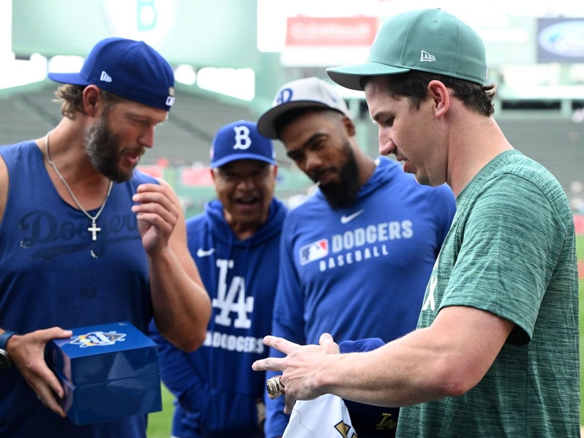 Jul 25, 2025; Boston, Massachusetts, USA; Boston Red Sox starting pitcher Walker Buehler (0) receives his 2024 Los Angeles Dodgers World Series ring before a game at Fenway Park. Mandatory Credit: Brian Fluharty-Imagn Images