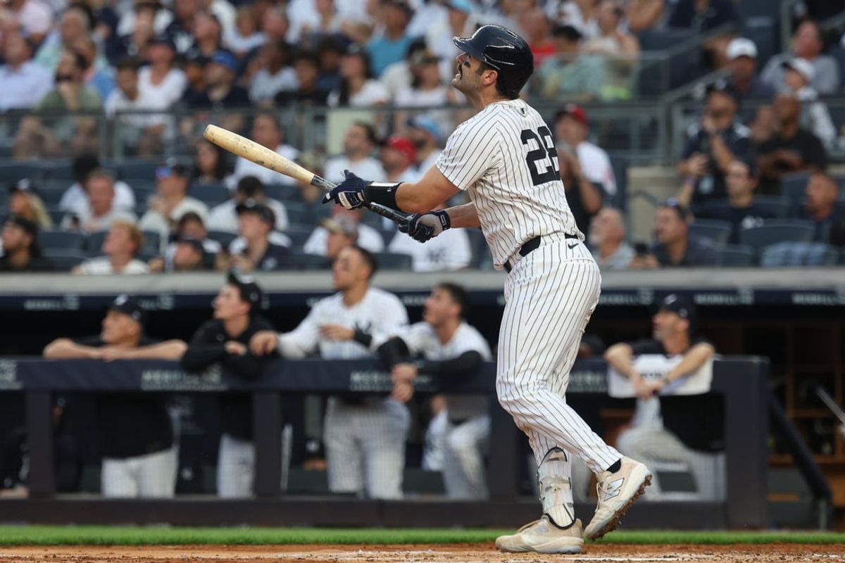 Jul 25, 2025; Bronx, New York, USA; New York Yankees catcher Austin Wells (28) hits a solo home run during the second inning against the Philadelphia Phillies at Yankee Stadium. Mandatory Credit: Vincent Carchietta-Imagn Images