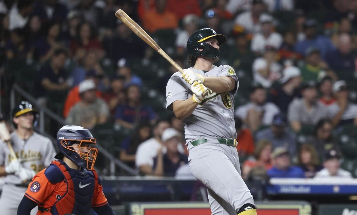 Jul 25, 2025; Houston, Texas, USA;  Athletics designated hitter Nick Kurtz (16) hits his third home run of the game during the eighth inning against the Houston Astros at Daikin Park. Mandatory Credit: Troy Taormina-Imagn Images
