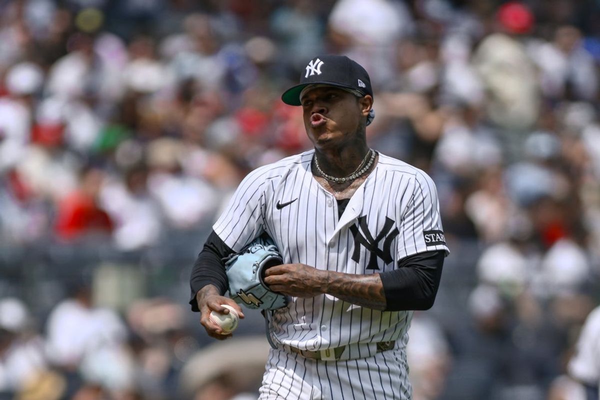 Jul 26, 2025; Bronx, New York, USA; New York Yankees pitcher Marcus Stroman (0) reacts after walking Philadelphia Phillies outfielder Johan Rojas (not pictured) with the bases loaded to surrender a run during the fourth inning at Yankee Stadium. Mandatory Credit: John Jones-Imagn Images