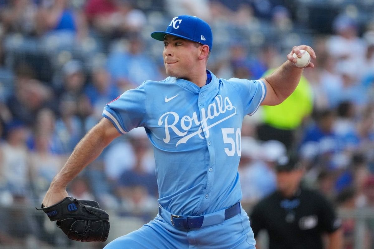 Jul 26, 2025; Kansas City, Missouri, USA; Kansas City Royals starting pitcher Kris Bubic (50) delivers a pitch against the Cleveland Guardians during the first inning at Kauffman Stadium. Mandatory Credit: Denny Medley-Imagn Images