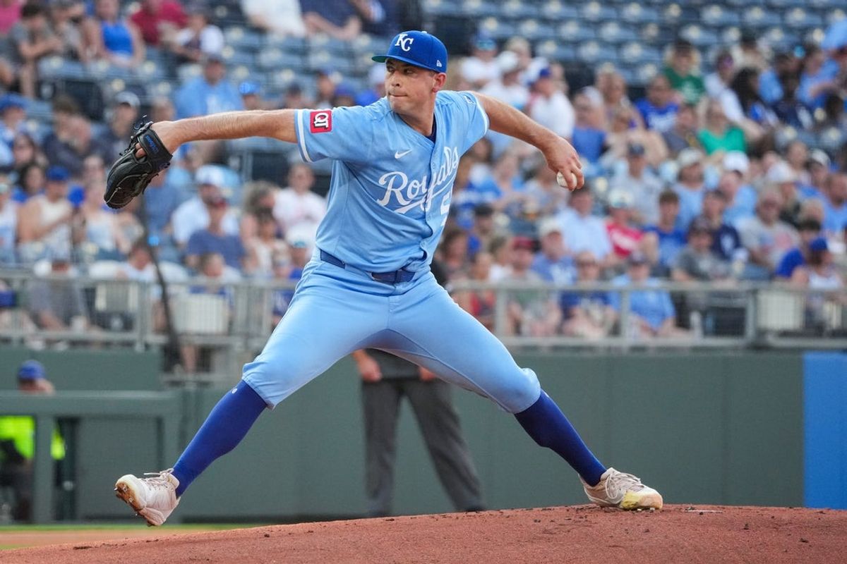 Jul 26, 2025; Kansas City, Missouri, USA; Kansas City Royals starting pitcher Kris Bubic (50) delivers a pitch against the Cleveland Guardians during the first inning at Kauffman Stadium. Mandatory Credit: Denny Medley-Imagn Images